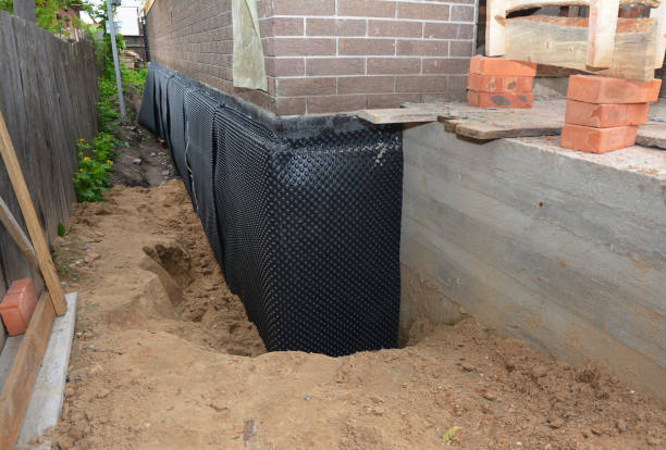 Happy homeowners after waterproofing job in Gloucester City